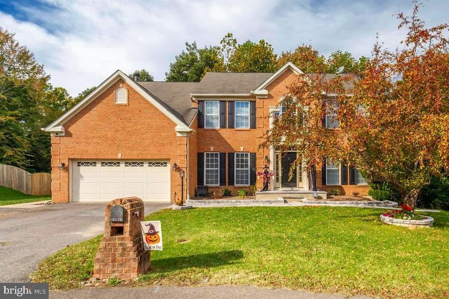 WELCOME HOME! Welcome to Richfield Station!  Check out this Spacious Colonial brick front home! Newly Renovated 5 bedroom, 3 full bath, 1 half bath home, plus 2 car garage.  This home is nestled perfectly in a private cul-de-sac. It is one of the Largest Models in the Neighborhood! This Gorgeous home offers high ceilings throughout, and custom build windows. The kitchen is the Best of all! It features a large Island with stove.  The kitchen offers tons of cabinet space, with custom built cabinets in the island as well. And also features New granite counters tops, custom backsplash and New  Appliances. The main level has hardwood Flooring throughout. The large Master Suite also features a  Bonus Room (currently used as a gym),  and a large Master Bath with separate Shower, and Soaking tub.  Upper level full bathroom fully recently remodeled. Fully Finished Carpeted walkout Basement with a Wet Bar, Full Bedroom and Bathroom. Don't forget the bonus bump out attached to the kitchen,  New Trex Deck! Great spot for Coffee in the Morning or that glass of wine in the evening! It overlooks the Treelined Private Backyard. The landscaping offers new stone pavers around the front flower beds and tree! Lets add some more sweet bonuses... Newly Remodeled Bathrooms, Two NEW HVAC Units, New Hot Water Heater and so much more! Not only is it close to the Beach, Boardwalk, Restaurants, Shopping, and More, it also is a quick commute to the Military Bases & Annapolis !! This Home is one you don't want to miss! Come see it today as this one won't last long!