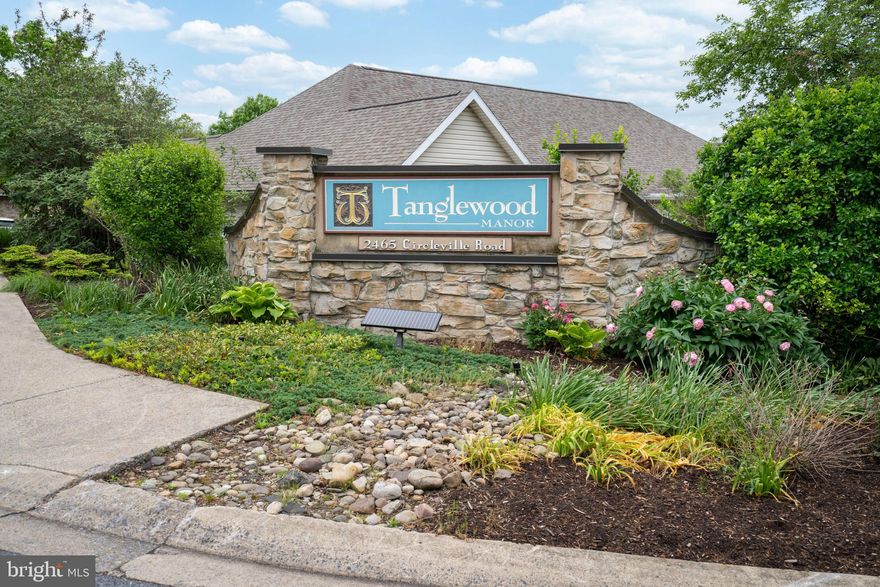 OPEN HOUSE - Sunday, May 31st, 12:00 - 1:30 PM. Stylish unit in Tanglewood Manor. At the end of the cul de sac and backing to quiet street. Close to shopping, main roads and highways, bike path to PSU and bus service. This one-owner duplex unit is in excellent condition and boasts upgraded lighting and ceiling fan, renovated kitchen and primary bath. Beautiful hardwood floors on the main floor. There is an  office that could be a bedroom that has french doors for privacy, a large living/dining and kitchen area with vaulted ceilings, gas fireplace, laundry area and second full bath with newer vanity. Small room that could be a bedroom or office. Upper level is a private bedroom suite with its own full bath. Perfect for guests. Lower level is an open large room with full egress and a full bath. Plenty of unfinished storage area too. The back patio has plantings and trees lending privacy. Carefree living with condominium association taking care of exterior building maintenance, snow removal, water, sewer and trash, internet & cable and clubhouse. Roof was replaced in 2022.  Condominium documents available under documents tabs. Fee is $515/month.  Special assessment of $100/month for 2026 to cover special projects.
