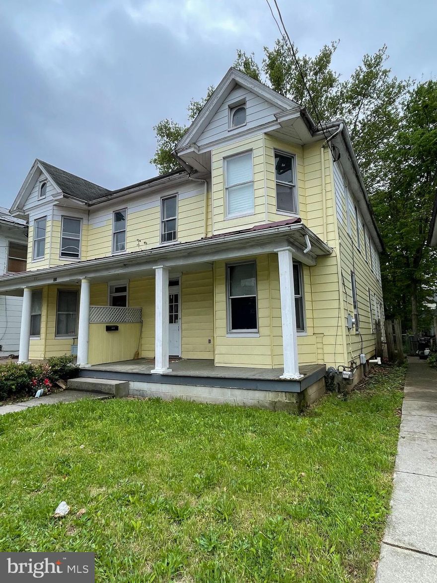 Hardwood flooring throughout most of the home.  Some updates done featuring a renovated kitchen.  4 spacious bedrooms and 1.5 bathrooms.  Walk up attic, great for storage or finish for another bedroom! 
 Fenced in back yard, with an alley accessed garage.  High speed internet available.  Agent is owner.  the entire building, 723 W King st can also be purchased with this home for a discount.  723 W King St unit is currently occupied with a great, on time tenant.  Live in one while you rent the other!