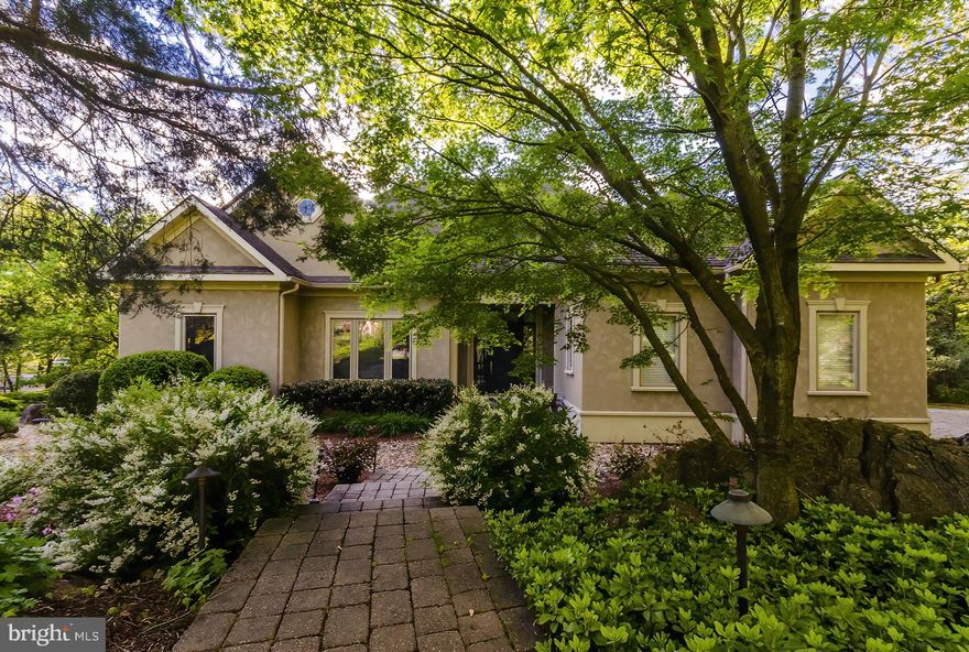 Custom built home on a quiet cul-de-sac surrounded by lush landscaping. All BRs have own bath,all wood floors,  solar panels (why pay an electric bill), tankless HW heater, 12'Ceilings, side load garage, 2 FPs, golf course community w/swimming, tennis, dining. So close to Shepherd U and Wellness center and easy bike ride to C &O Canal, Potomac River and More.Work, live, play at home! A truly remarkable property. Take a look at say Ahhhhh!