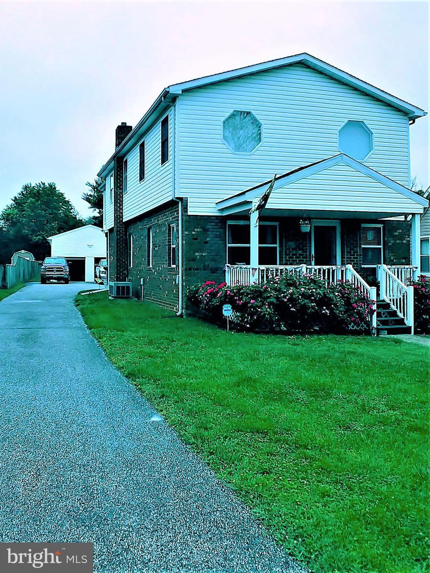 4 Bedrooms, 3 Baths, Open Living room  and Dining room,Larger  Bedroom has walk-in closet and MBA w/jetted tub and separate shower, also a second floor sun room off Main bedroom. Zoned heating and ac, rear & front porch, Over size 4 car detached garage w/attic storage, plenty of parking, and large yard !!!