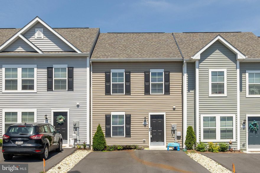 This interior unit townhome is the best of both worlds, new construction and immediate occupancy. Built less than two years ago, this Madison floorplan townhome features 3 bedrooms, 2.5 bathrooms, and numerous upgrades. The main floor layout is the height of flow and function with an open floorplan and large kitchen island. Located conveniently between Inwood and Charlestown off of 51, the owner has access to main roads, schools, shopping... everything! Without being stuck in the middle of town! Please schedule your showing today!