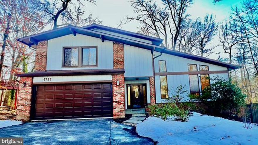 Welcome Home! Backs Parkland!  Walk to Kent Garden Recreation Club!

Discover a serene private retreat just minutes from downtown McLean! This fabulous 4-bedroom, 3.5 -bath contemporary home is tucked away on a peaceful private drive in a sought-after  McLean neighborhood. Perfect for entertaining! Incredible open floorplan!

With its mid-century modern charm, the home boasts NEW paint, NEW floors , a newer HVAC system, and a recently updated roof. Lovingly maintained by the original owner, it’s surrounded by mature trees and bathed in natural light throughout the day — offering a tranquil escape while staying close to everything.

Step into the bright foyer, where the open layout invites natural light to flow freely. The living room showcases a vaulted, beamed ceiling that seamlessly transitions into the dining area, complete with a large window framing picturesque views of the wooded backyard.

The gourmet kitchen features stainless steel appliances, ample cabinet space,  upgraded counters and opens to a spacious family room adorned with a wood-beamed ceiling, a stone gas fireplace, and sliding doors to the back deck.

On the main level, enjoy a sun-filled family room with large windows, recessed lighting, and access to the lush backyard — perfect for relaxation or entertaining.

Upstairs, the primary suite offers a tranquil retreat with a huge picture window, and a walk-in closet. Two additional bedrooms and a full hall bath complete this level.

The lower level features a spacious recreation room with built-ins, a wet bar, and a utility/laundry room. Beautiful new flooring is being installed throughout. The house is being painted. 

A large two-car garage provides plenty of storage. Plus, this home is part of the highly desirable McLean High School pyramid!

This gem offers the perfect blend of comfort, style, and a harmonious connection to nature. Don’t miss your chance to make it your own! Photos AI generated