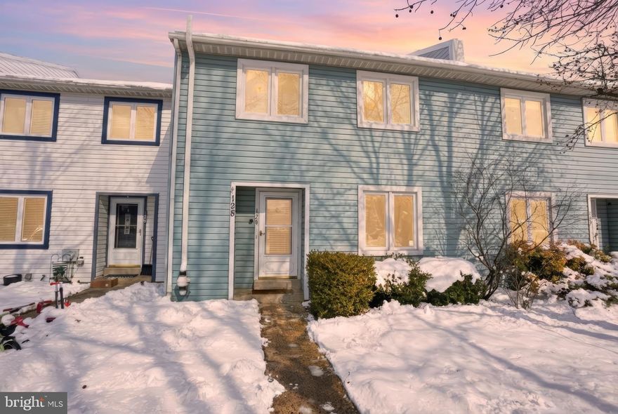 Welcome to 128 Krista Court, located in the Highlands community of Chalfont, this 2 story townhome offers 3 bedrooms, 1.5 baths, and 1,540 square feet of bright, functional living space. The main level features hardwood flooring, a foyer entry with crown molding detail, and a spacious living room with raised ceiling and a cozy wood-burning fireplace that anchors the space. Large rear windows and a sliding glass door bring in natural light and provide access to the fenced rear yard and patio.

The updated kitchen includes stainless steel appliances, tile flooring, a mosaic tile backsplash, ample cabinetry, and an adjacent dining room for everyday meals or gatherings.

Upstairs, the primary bedroom offers generous dimensions and dual closets, while two additional bedrooms and a full bath complete the level. The unfinished basement provides approximately tons of additional space for storage, hobbies, or future finishing potential, along with a dedicated laundry area.

The HOA fee of $180 per month supports snow removal, community maintenance, and the home includes two assigned parking spaces for convenience.

Situated in Chalfont, Bucks County, within the award winning Central Bucks School District, this property offers close proximity to parks, shopping, dining, and major roadways. 

A well-maintained, turnkey home in a great area make this Highlands property a great opportunity. Schedule your showing today.