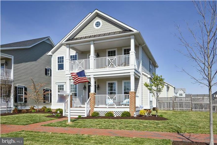 Premier lot in Gibsons Grant w/wide water views of Macum Creek offering beautiful sunsets and wildlife. Many upgrades including deck to enjoy the extra large back yard. Corner lot provides light filled rooms. Hardwood floors throughout 1st flr. Kitchen showcases a 5-burner gas cooktop, tiled back splash, granite counters, extra lge island, SS appliances. Huge MBR ste. w/tray ceiling and deck..