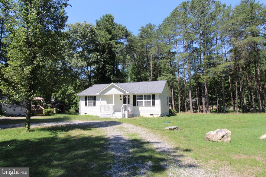 Super Cute Rambler on a double corner lot in amenity filled Lake Caroline. Enjoy the 270+ acre lake with community beaches, pool and  playgrounds.  Completely renovated only a few ago with new roof, flooring, appliances, counter tops and HVAC. Rear deck overlooks a lush wooded back yard.