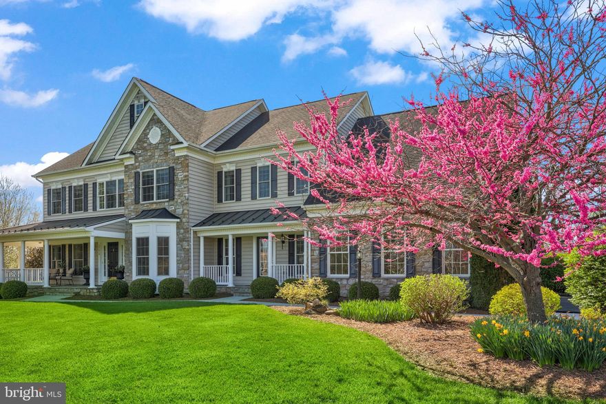 Welcome to 37619 Wright Farm Dr, a stunning 5-bedroom, 4.5-bath estate in Purcellville where gorgeous landscaping, lush green grass, and striking curb appeal create a beautiful setting from the moment you arrive. A large front sitting porch offers a peaceful place to unwind, leading into a grand two-story entryway that opens gracefully into the home's inviting interior.

Designed with both everyday living and entertaining in mind, the main level flows effortlessly from a formal dining area to an elegant sitting room and a private office. The two-story living room is filled with natural light, creating an airy, open feel that carries throughout the home.

The kitchen is truly the heart of the home.

Thoughtfully designed with glazed maple cabinetry, professional stainless steel appliances, custom hood, an island, and a walk-in pantry, it blends style and function seamlessly. It opens to a bright breakfast area and a sunroom-inspired sitting space with floor-to-ceiling windows, offering the perfect backdrop for quiet mornings or relaxed evenings overlooking the scenic surroundings. A main level laundry room adds everyday convenience.

Upstairs, the primary suite provides a private retreat, generously sized and featuring its own office space along with a luxurious en suite bath. Each additional bedroom offers direct access to a full bath, creating comfort and privacy throughout the upper level.

The lower level expands the living space with a fully carpeted area ideal for recreation, gatherings, or movie nights, along with an additional bedroom and full bath that is perfect for guests.

Outside, the property continues to impress with an oversized deck, firepit, and multiple sitting areas that invite you to enjoy the peaceful setting.  The landscaping presents like an arboretum, with fruit orchards and many uncommon tree varieties. The lush lawn and natural scenery create a serene outdoor experience overlooking the Catoctin Creek, while a shed adds extra functionality.

Schedule your tour today and experience it for yourself.
