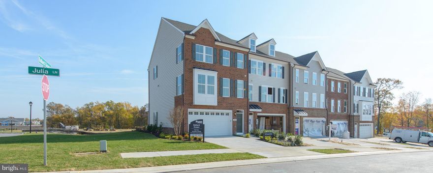 Stunning McPherson built to buyers' specs & settled in Ballard Green in Owings Mills. This home incl Brick Fr, 4BR/3.5 BA, Granite Tops/Upgrade Cabs throughout, HW Main & Foyer, HUGE Is, S/S Appl incl Fridge, Luxury Owner's BR w/Sep Tub/Showr, upstairs laundry, Gar Door Opener, Lower level BedRm & Bath, Composite Deck,  Pix representative only.