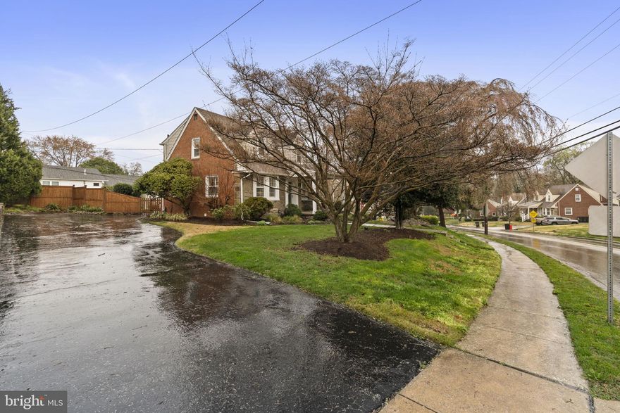 Charming, renovated Cape Cod in Springfield School District! Features include a welcoming front porch, living room with wood-burning stove, and a remodeled kitchen with tile countertops and stainless steel appliances. The finished basement (2022) offers flexible space and a full bath and shower. Upstairs boasts 3 bedrooms with hardwood floors and a remodeled bathroom. Enjoy the large lot with a patio, garden, and shed, also the most beautiful trees on the street. Conveniently located near amenities, transportation, and all major transportation. A must-see! Seller is a licensed Real Estate Broker