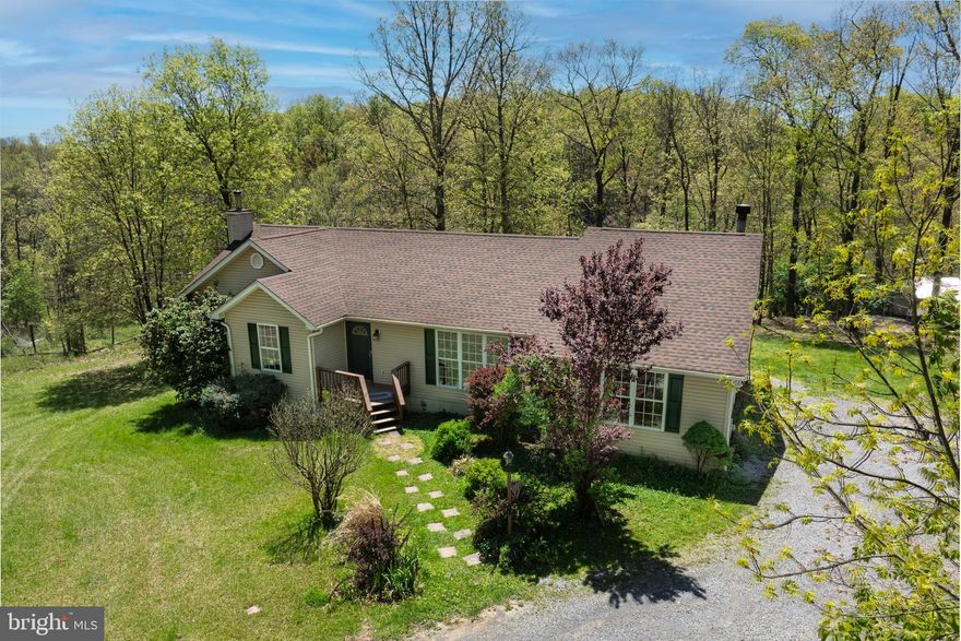 ***OPEN HOUSE  MAY 4TH 1PM-3PM*** Peaceful Country Living on 5.1 Unrestricted Acres. *** PHOTOS COMING SOON***
Welcome to your private retreat at the end of a quiet, state-maintained road. This beautifully maintained 2,200 sq ft home sits on 5.1 unrestricted acres, offering the perfect mix of open space and wooded privacy. Whether you're dreaming of a hobby farm, a hunter’s hideaway, or a place to just get away from it all—this property has it all.

The home features a spacious living room, perfect for family gatherings, and an eat-in kitchen with all new appliances where meals and memories are made. Step out from the kitchen onto a generously sized deck, ideal for enjoying your morning coffee or watching the sun set over the peaceful landscape. The primary bedroom includes an en suite bathroom, offering comfort and privacy, while a cozy family room with a fireplace provides the perfect setting for cold winter nights.

A full basement with roughed-in plumbing offers potential for an additional bathroom and living space, while a wood-burning stove helps lower electric bills during the colder months. The home also includes a whole-house water treatment system for added peace of mind.

Outside, the property shines with a small wet-weather stream at the bottom of the land, partially wooded acreage perfect for hunting, and ample space to start your own garden or hobby farm—bring your chickens, goats, or horses! There's even a basketball court so the kids can shoot hoops, and a storage shed for your gardening and lawn tools.

Freshly professionally painted and cleaned, this move-in ready home offers the best of peaceful living with plenty of modern comforts.

Don't miss your chance to own this slice of country paradise—schedule your private showing today!