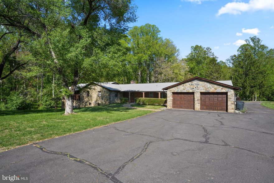 $100,000 PRICE REDUCTION!

A rare opportunity to own a 7+ acre private estate in Clifton, Virginia with an indoor and outdoor pool. This property also features a fully separate 30x60 two-level warehouse, ideal for business owners, car collectors, contractors, or anyone needing serious workspace at home.

This 5-bedroom, 5.5-bath home with nearly 4,000 square feet delivers the kind of flexibility today’s buyers are actively searching for: multi-generational living, work-from-home functionality, and resort-style features.

Set on 7.04 wooded acres, the property offers complete privacy while still being conveniently located near Fairfax, Centreville, and major Northern Virginia hubs.

Inside, the home features expansive living spaces designed for both everyday comfort and entertaining. A standout feature is the indoor pool, creating a year-round retreat rarely found in Clifton homes.

Additional highlights include:

-Second kitchen ideal for extended stays or multi-generational living
-Spacious bedrooms with multiple ensuite baths
-Functional layout with room for office, gym, or guest suites
-Attached garage + ample outdoor space for future expansion or customization

Built in 1964 and thoughtfully maintained, this property blends classic construction with modern flexibility, making it ideal for buyers looking to personalize and add long-term value.