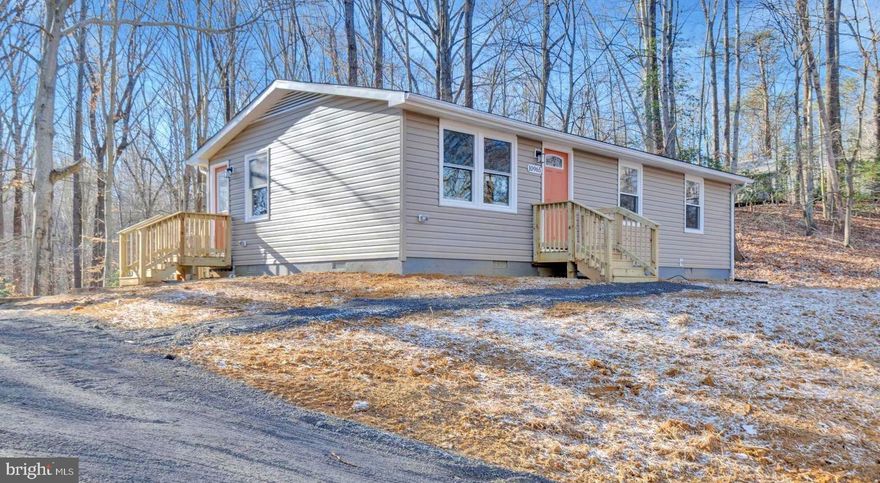 Beautifully renovated and expanded rambler situated on 1.95 acres just outside the town of  La Plata, Md (no town tax). Originally 960 sq ft, this home has been expanded to over 1,200 sq ft of finished living space, featuring an enlarged primary bedroom with a walk-in closet and improved layout.

Recent upgrades include:

Newly installed HVAC system
New roof
New doors and windows
Newly installed well
Washer and dryer convey
Deck
Expanded interior living space

Enjoy a peaceful rural setting while remaining convenient to downtown La Plata, shopping, and commuter routes. This property offers land, privacy, and modern upgrades — an excellent opportunity for buyers seeking space and long-term value.  Seller prefers Southern Maryland Title. Listing agent has financial interests in the property.