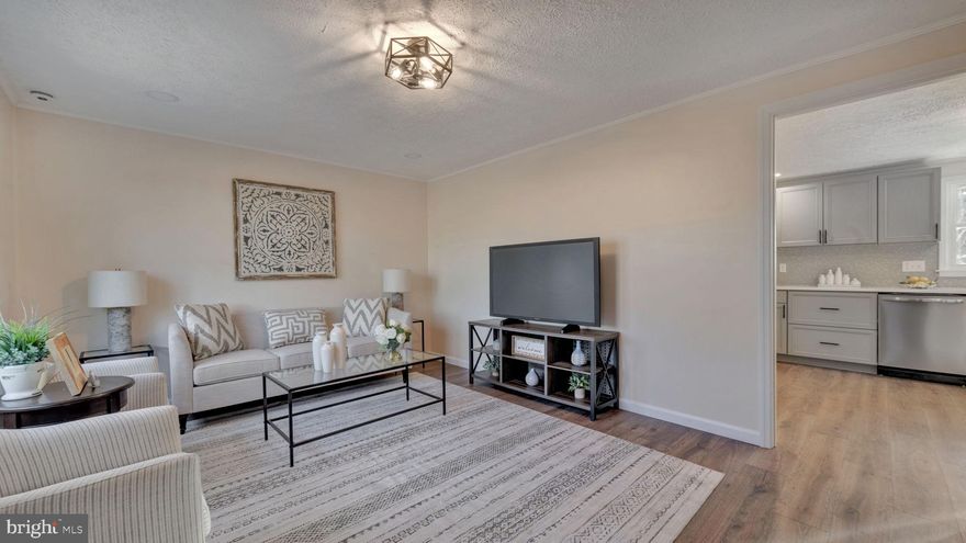 Welcome to your private retreat on 1.95 acres just outside the Town of La Plata — offering peace, space, and no town taxes.

This beautifully renovated and expanded rambler has been thoughtfully reimagined from its original footprint of approximately 960 square feet to over 1,200 square feet of finished living space, creating a more open and functional layout. The home features an enlarged primary bedroom with a walk-in closet, along with improved flow designed for comfortable everyday living.

Recent upgrades include a new HVAC system, new roof, new doors and windows, and a newly installed well, providing added efficiency and long-term peace of mind. A rear deck extends the living space outdoors, and the addition of a dedicated laundry area with a full-size washer and dryer enhances everyday convenience.

This home is ideal for buyers seeking simplicity without sacrificing space, offering the perfect balance of indoor comfort and outdoor freedom. The nearly 2-acre lot provides privacy, flexibility, and room to enjoy a peaceful setting, while still being conveniently located near downtown La Plata, shopping, dining, and major commuter routes.

Whether you’re looking for a full-time residence, a downsized lifestyle with land, or a property with long-term potential, this home offers a unique opportunity in a desirable Southern Maryland location.

USDA 100% financing available for eligible buyers.
Seller prefers Southern Maryland Title. Listing agent has a financial interest in the property.