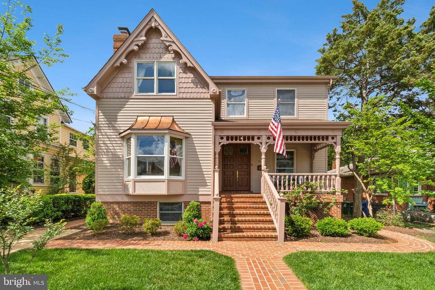 An elegant brick walkway leads to this Victorian styled home located in quiet, sought after Glencarlyn. Covered front porch presents amazing, one-of-a-kind 8’ tall double doors into a fantastic foyer entry with soaring ceilings. Hardwood floors greet you and are continued throughout the main and upper levels, covered by plush carpets upstairs. Intricate details set this home apart; built with repurposed wood, moldings, mantels and doors from antique and vintage homes throughout the Commonwealth of Virginia. Generously proportioned floor plan includes traditional elements such as a formal living room, formal dining room as well as special details such as stained-glass windows, abundant wood paneling, transom windows and tall ceilings. The eat-in kitchen and breakfast area are paneled with gorgeous pine along the vaulted ceilings, and the kitchen features a center island with stainless-steel gas range, abundant wood cabinetry and quartz countertops. Just off the kitchen is a fantastic, screened porch/ sunroom with beautiful brick floor as well as main level laundry and additional storage. A large main level bedroom can double as a home office and is adjacent to the main level full bathroom, making this home ideal for one-level living. Upper-level features two large bedrooms, including the primary bedroom complete with a sitting room, fireplace and large walk-in closet. Upper-level bathroom is en-suite and features tub, pedestal sink and a medicine cabinet. Newly finished lower level features the fourth bedroom, third full bathroom, abundant storage/ workshop/ utility space and access to the backyard. Large rec room in the lower level with abundant natural light is anchored by a brick mantle that can feature a wood stove and features a wet bar complete with kegerator and enough space for a home gym. Very well-maintained home features dual zone HVAC, newer systems and appliances, freshly painted exterior trim and siding and is entirely move-in ready. Tranquil backyard oasis includes a shed styled to match the home, brick patio, side deck, mature landscaping plus abundant grass and garden beds. Amazing central Arlington location is hard to beat! Located in Glencarlyn, close to the Columbia Pike corridor boasting abundant shopping, dining and grocery options, easy access to commuting via Route 50, I395, close proximity to Ballston for Metro, a short commute to Washington D.C., as well as Amazon’s HQ2 Headquarters @ National Landing, Reagan DCA Airport and much more!