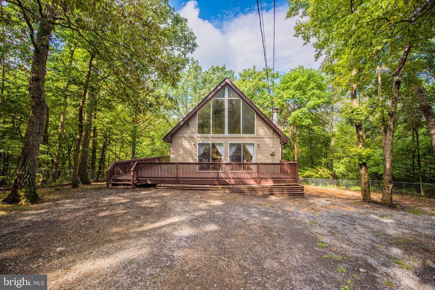 Here It Is  Come See! Cute, Cozy A Frame On 1 Acre-Approx Half Acre Wooded, Large Front Deck, Inside-Open Concept, Large Kitchen. Main Level Has 1 Bedroom And 1 Bath On Main Level, Upper Level Has 1 Large Bedroom With A Large Closet,  Lower Level Has 1 Bathroom, 1 Bedroom and A Kithen Area And A Rec Room. Freshly Painted Throughout, Tile In Kitchen And Bathrooms. Updated Vanities In Bathrooms.  2 Car Detached Garage For Extra Parking And Additional Parking In Front Of Home. Washer and Dryer Approx 3 months old and will convey. Seller In The Process Of Moving, Please excuse boxes when showing.