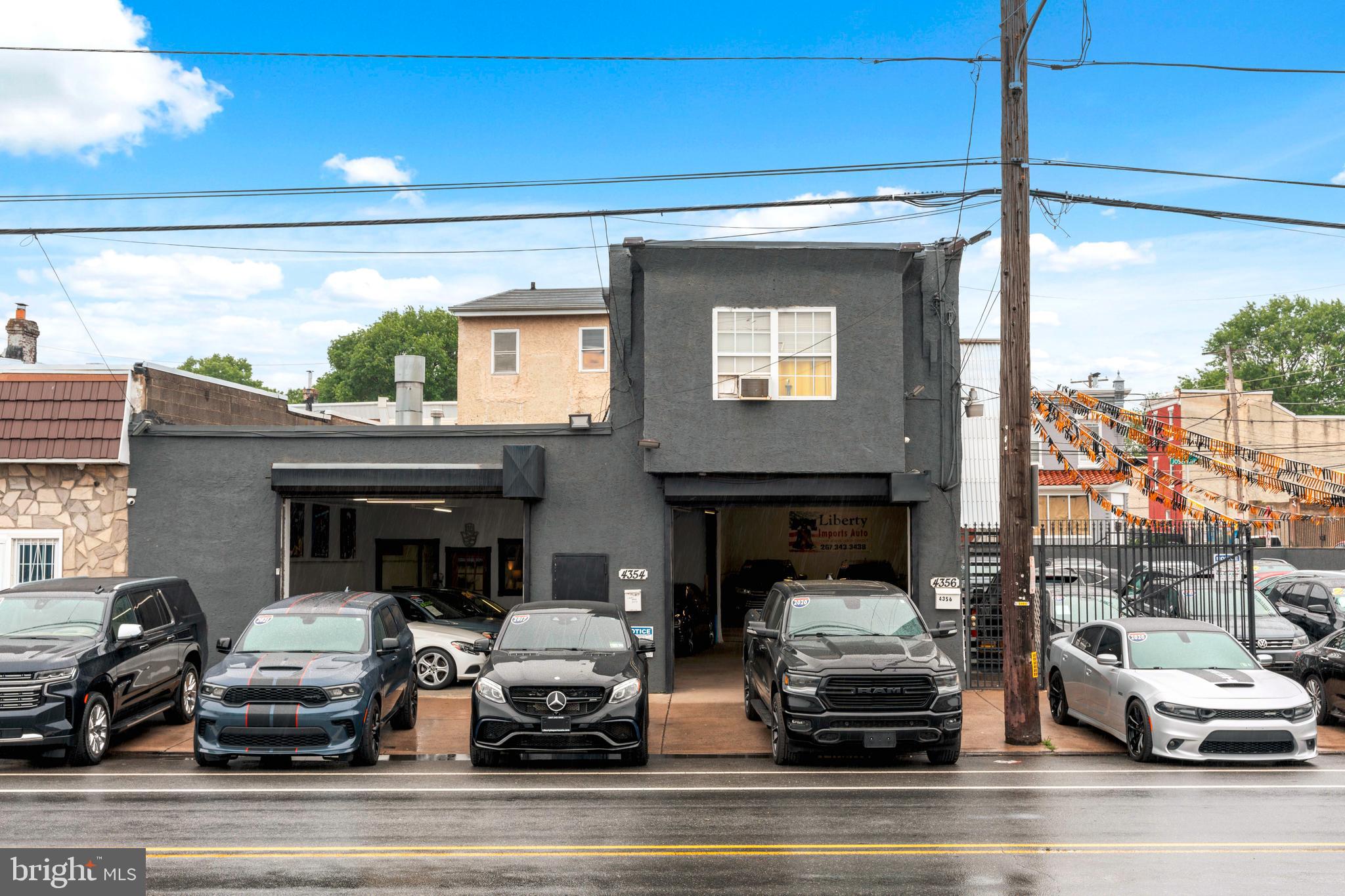 This incredible opportunity offers a fully operational auto dealership located in a prime, high-traffic area, perfect for entrepreneurs or investors seeking a profitable business venture. The property includes 34 parking spots, both inside and outside, with 19 spots accessible through three-axis gates leading into a spacious garage—ideal for vehicle storage, display, or service. The front of the property is complemented by wide sidewalks, ensuring excellent visibility and easy access. Inside, the property has been fully remodeled with several offices, two bathrooms, and a modern layout that accommodates any auto dealership or automotive business. The property is grandfathered in with zoning that allows for an auto shop, mechanic services, and body shop operations, providing immediate flexibility to operate your business without the hassle of zoning approvals. In addition to the commercial space, there are two income-producing rental units—a two-bedroom apartment that rents for $900/month and a three-bedroom, one-bath row home in the rear of the property that rents for $1,200/month. Both units have two-year leases in place, ensuring steady rental income. Whether you’re looking to establish your own dealership in a bustling location or rent the property out to another automotive business, this is a unique investment opportunity with immense potential. Don’t miss the chance to own a prime commercial property that delivers both business and rental income in a growing area—contact us today to learn more!
