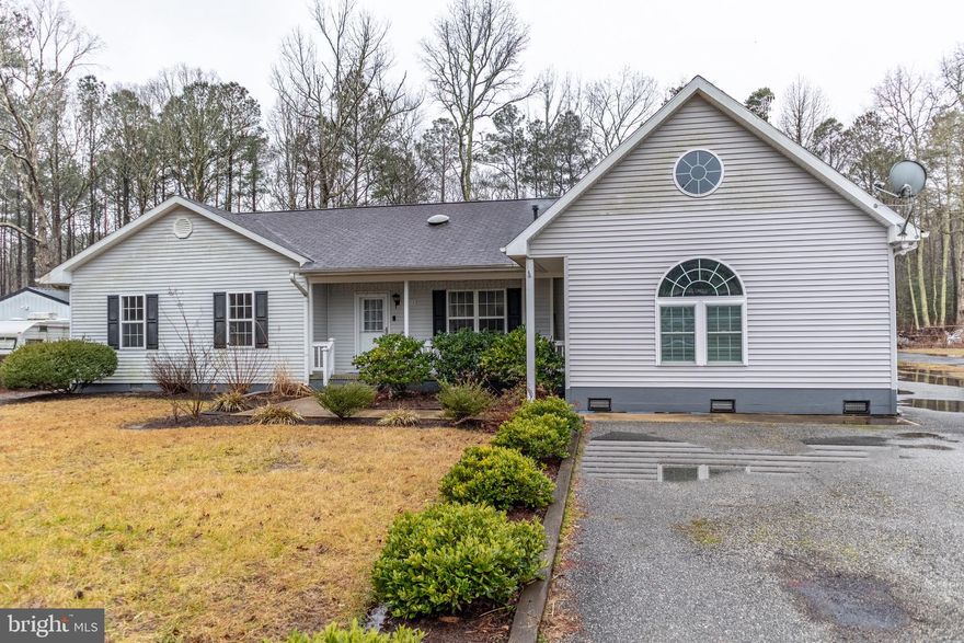 Nestled away down Croopers Island Road just a few miles outside of Ocean City  sits this 4 bedroom 3.5 bath, with a flex room for office, workout room,  or 5th bedroom, home sitting on .46 acres of land.  Enjoy the privacy of a fenced in yard and two large garages to store all your toys.  (12' X 24" and a 16 X 32 Approximately)  This home  comes equipped with a  separate suite for quest or family with its own kitchen and bath   2500 sq ft.  of indoor space as well as a large deck and back yard make this the perfect place to rest your family.