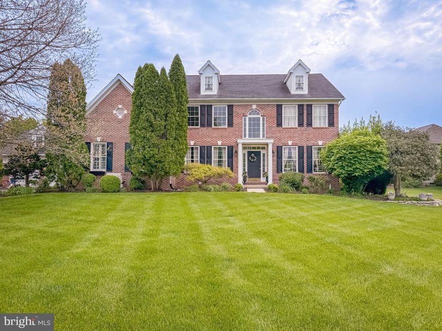 Welcome to 318 Wild Prairie Court in the highly desirable Chestnut Creek subdivision!  A well-maintained PAONE-built Federal Style Colonial Home located on a private cul-de-sac with a large lot over half an acre.  You will find plenty of space and thoughtful updates that elevate everyday living and entertaining for a large family, inside and outside, including the addition of an in-law suite and two-car detached garage with bonus loft. This home offers classic architecture, including random-width Brazilian Cherry floors throughout the first floor and master suite.   A dramatic two-story foyer sets the tone as you enter and accentuates the open floor plan and room to room flow.  The first floor features a dramatic two-story family room with a custom American Cherry mantel and four large double-pane windows that fill the space with natural light.  The deep finish of mahogany and cherry set warm tones throughout the first floor living space.  Formal Living and Dining Rooms showcase timeless details including open entry ways, natural light, and large picture windows making them ideal for holiday entertaining. A private Office with French doors provides a dedicated work-from-home space. The large Kitchen has been updated with stainless steel appliances and includes a breakfast area with glass doors to the large rear patio and yard.  The large in-law suite features a separate entry way, side foyer, large bedroom, and full bath.  The addition blends seamlessly with the original home and provides a private space for guests or special care of a loved one. Upstairs, the Primary Suite offers Brazilian Cherry flooring, generous closet space including a walk-in, and large Primary Bathroom with shower and tub. Three additional large Bedrooms share a full Hall Bath. The professionally finished lower level features a large Philippine Mahogany bar and wainscoting throughout that is ideal for entertaining.  The exterior improvements enhance curb appeal and function, including well-manicured beds, three-season flowering shrubs, mature oaks in front, dogwoods, crape myrtles and a large weeping willow in the rear, and a large, private brick patio to enjoy outdoor living. Ideally located near Route 309, the PA Turnpike, and SEPTA rail, with easy access to shopping, dining, and Ambler Borough. Just a five-minute walk from open green space at Whitemarsh Memorial Park and within the Hatboro-Horsham School District. Call for your showing TODAY!