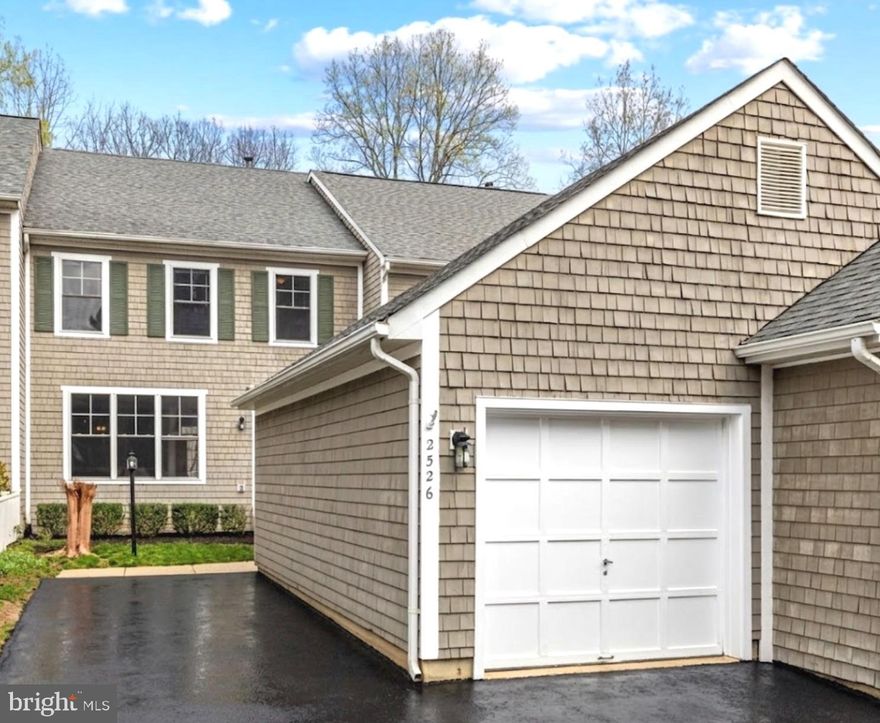 Welcome to Reston and welcome to Brenton Point. This immaculately maintained house is ready for it's next family to call it home! This is the largest model in the community and features a three-level bump-out adding tremendous interior space where you need it most; in the primary bedroom, the kitchen, and in the lower level family/rec room. This very bright and very open floor plan is so flexible that decorating is easy-easy! Stepping inside the front door you will be greeted with massive windows and hardwood floors. There is a half bath to your right, and the formal living room to your left followed by a large formal dining space. Stepping towards the rear you will find the first (of two fireplaces) a large well appointed kitchen with granite and stainless appliances and the first bump-out which is ideal for a kitchen table, a kids homework and play area, or a cozy reading nook! The deck is just beyond the kitchen/family room and please pause to note the amount of natural light coming through the upgraded double hung windows AND the water views of Reston's Lake Audubon! Yes. Water views! Amazing views from inside the home on the main level, the upper level, and of course from the rear deck too! Heading upstairs you will find a kids "reading nook" or a "dog house" nestled on the landing and upon arriving at the top floor, three bedrooms, two full bathrooms, and upper-level laundry await! The two guest rooms are well-sized and feature overhead lighting and the laundry room is fully built out making use and storage of cleaning supplies easy. The primary bedroom is on the rear of the home and it is awesome! Large with vaulted ceilings, a fully built out custom walk-in closet, and the primary bathroom is special. Dual standing showers, custom glass, dual vanities, and a makeup counter too! This primary bedroom is one of the nicest you can find in all of Reston... it is very very nice! The upper level features hardwood throughout the bedroom spaces and tile floors in both of the recently updated full bathrooms. The lower level is special in its own right... a very VERY large flex room/bedroom is to your left with a closet and private access to the third full bathroom making it absolutely perfect for guests! The lower level also features a wet-bar which includes a small fridge, a second gas fireplace, a large family/rec room and the bump-out is ideal for a home office, a home gym, or a reading space, hang out space, or just about anything else you can think of. The lower level also features full size windows on the rear and step outside to the fenced-in yard complete with a private brick patio! Beyond the fence is a short walk to the lake... it is so close and so beautiful to walk around or jog or just to look at. The home also features a one-car garage with opener and EV charger ready to go and a driveway that can accommodate an additional two or three vehicles as well. This home is inspected and move-in ready needing nothing! Three levels, three bump-outs, two fireplaces, built in speakers, ceiling fans, recessed lights w/dimmers, dual zone heating/cooling, gas cooking, EV charging, lake views, fenced in yard, deck, patio, garage.... this one is AWESOME!