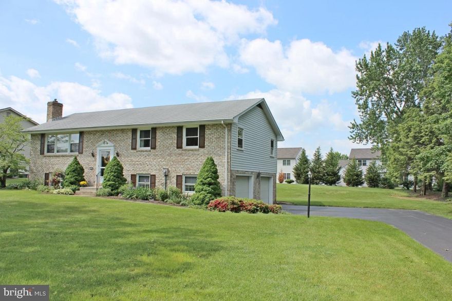 Very Well Maintained Brick Face Home w/Sun Room Addition Featuring Vaulted Ceiling & Skylights. Propane Stove on Brick Hearth in Family Room on Lower Level. Open Kitchen to Dining Area. Central Air is only 4 Years Old. Economical with Extra Insulation Recently Added. Level Almost Half Acre Lot. 2 Car Garage and Long Driveway for Plenty of Off Street Parking.