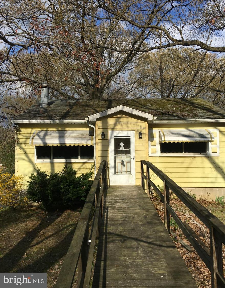 Cute rambler situated on over 1/3 acre lot.  Property sold strictly "as-is".  Seller will make NO repairs.  This is NOT a Homepath property.   All bank addendum generated after contract acceptance.