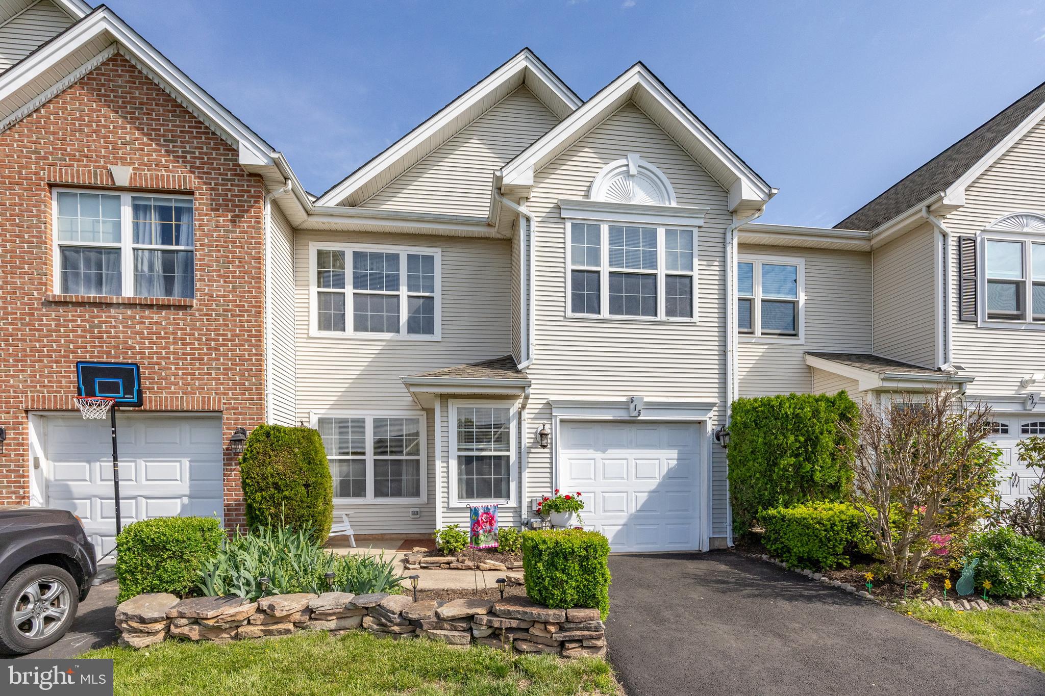 Rare Opportunity to own a home in Perkiomen Greene — No HOA!
Fall in love the moment you step into this beautifully maintained townhome! The welcoming foyer features new flooring that flows seamlessly throughout most of the open-concept first floor.
The bright and sunny family room boasts soaring two-story ceilings, large windows, and a cozy fireplace — perfect for relaxing or entertaining. The open kitchen offers quartz countertops, ample cabinetry for all your storage needs and stainless appliances. Sliding door to the rear patio!
Enjoy the spacious living and dining rooms, ideal for gatherings. The first floor also includes an updated half bath, a closet, a utility room, and access to the attached garage.
Upstairs, you'll find a generous primary suite with double closets and a luxurious en-suite bath featuring new ceramic tile flooring, a soaking tub, separate shower, dual vanities, a linen closet. Two additional spacious bedrooms with plenty of closet space. Hall bathroom with ceramic flooring.
You'll love the convenience of a dedicated laundry room — not just a closet!
Step outside to a private, fenced-in rear yard with a paver patio — perfect for outdoor living.
New driveway, newer roof (2020).
Don't miss your chance to own this gem in Perkiomen Greene with no HOA fees!