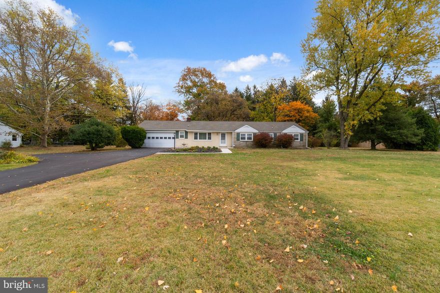 Welcome to this beautifully maintained 3-bedroom, 1.5-bath ranch home set on a spacious 0.87-acre lot in Montgomery Township. This property combines classic comfort with modern convenience, offering single-level living in a peaceful suburban setting.  Step inside to find a bright, open living area featuring large windows that fill the home with natural light. The updated kitchen includes ample cabinet space and room for casual dining, while the adjoining living areas make entertaining effortless.  Three well-sized bedrooms provide comfortable space for family, guests, or a home office. The main bathroom is conveniently located near the bedrooms, and a half bath adds extra practicality to the main bedroom.  Outside, enjoy your private backyard oasis — perfect for gardening, gatherings, or simply relaxing. The nearly one-acre lot offers plenty of space for outdoor living, expansion possibilities, or future additions.   Additional highlights include a 2 car-attached garage, new roof 2023, new AC in 2023, newer windows throughout home and easy access to major routes, shopping, and local parks. Located within the sought-after North Penn School District, this home is ideal for anyone seeking a blend of tranquility and convenience.  Don’t miss the opportunity to make this Lansdale gem your own!