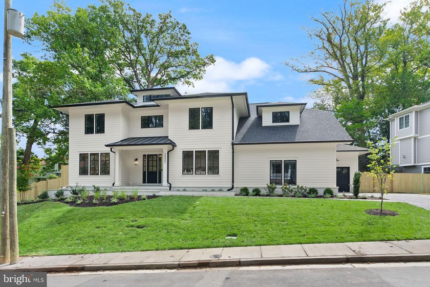 Welcome to another spectacular custom home by popular builder M-R CUSTOM HOMES. With nearly 6,135 finished square feet of living space on a spacious 16,113 square foot lot with 3 CAR GARAGE.  This home features 6 bedrooms, 6.5 bathrooms on 3 levels, including a main floor bedroom/study with full en suite bathroom. The home chef will love the showcase gourmet kitchen with 48" Wolf gas range, 48" Sub Zero refrigerator, 30” Wolf microwave, 2 Bosch dishwashers, huge island with 2 ½” quartz countertops, large walk-in pantry, and custom inset maple cabinetry. The beautiful kitchen is open to the family room with its 42” gas fireplace, coffered ceiling, and with access to the screened porch. A formal dining room with Butler’s pantry, a separate living room/library, a powder room, and a spacious mudroom with built-in cubbies, bench, and designer tile complete the main level. 10’ ceilings on main level. 7” White Oak hardwood flooring throughout main and upper levels. Head upstairs to the luxurious primary suite with its his-and-hers large walk-in closets and a spa-like primary bath with double vanity, frameless heavy-glass enclosed shower, and freestanding soaking tub. Three secondary bedrooms, all with full en-suite bathrooms and walk-in closets, and a laundry room complete the upper level. The spacious basement features an expansive recreation room with 7” Luxury Vinyl Plank (LVP) flooring, a wet bar, a bedroom, a full bathroom, an exercise room, and a finished storage room. 9’ ceilings in upper level and lower levels. Loads of storage on every level. Ceiling mounted speakers in kitchen, dining room, family room, screened porch, primary bedroom and bath, and basement rec room. 3-season screened porch off the main level with its all-weather Trex flooring, skylights, ceiling fan, heaters, and stairs leading to the back yard make this home perfect for entertaining. 3-car garage. Within a mile of Washington Golf and Tennis Club, Donaldson Run Park/Marcey Park/Potomac Overlook Regional Park with their multitude of sports courts and nature trails. Close to Arlington shops, restaurants, and entertainment. TAYLOR ES, DOROTHY HAMM MS, YORKTOWN HS. Expected Delivery late July 2025.