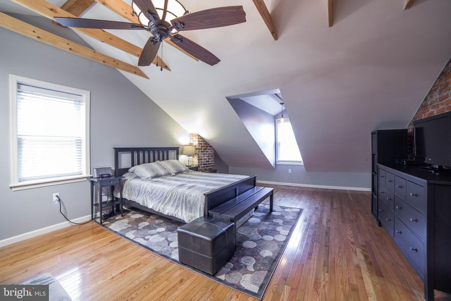 Welcome to this spacious and charming Wissinoming twin! Situated on a double lot with a driveway and detached garage, this 4-bed, 3-bath home has been renovated throughout. As you enter the living room, you'll notice the exposed brick wall to your left, original built-in shelves on your right, high ceilings with recessed lighting above, and original antique wood floors below. Enjoy tons of natural light with the many front and side windows or the privacy with custom wood blinds in each window. The bay window with built-in benches can be the perfect reading nook or breakfast spot. There are two doorways that lead into the dining room and the exit to the side covered porch. Through the dining area you will find a complete rebuilt kitchen with tile floors, granite counter tops, a kitchen island, shaker style white cabinets (& separate pantry), under-cabinet lighting, and stainless steel appliance package. The fridge/freezer has a water line to enable the ice maker and water/ice dispenser. In the corner of the kitchen is a convenient half bath. Through the sliding glass door you will find a new concrete patio and the rear yard with a new fence and string lights. On the second floor you will find 3 bedrooms (one with a large walk-in closet) (all with redone wood floors and updated fixtures) and a full bath. The floor was also completely rebuilt with hardwood floors, exposed brick wall & chimney, exposed beam, dormer windows, a custom closet with rear storage door, and a full bathroom with jacuzzi-style tub and custom tile. The basement, though unfinished, provides plenty of storage, has the washer & dryer, and has all new parging and sealing on the walls. The detached garage is perfect for additional storage, auto repair, woodworking, etc. Set up your showing today to see this one-of-a-kind home for yourself. (Seller is a PA Real Estate licensee)