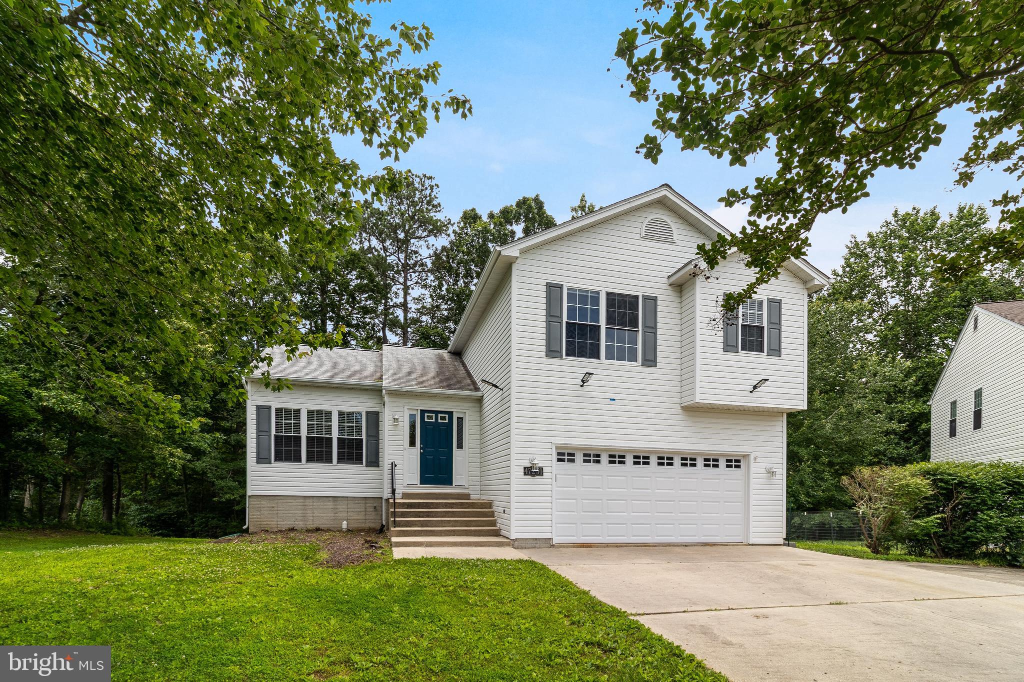 If space, style, and a little serenity are on your wish list—welcome home. This stunning multi-level beauty has been thoughtfully updated from top to bottom in 2023 and is ready to impress!
Step into an open-concept main level with a gorgeous brand-new kitchen featuring sleek quartz countertops, a large center island perfect for gathering, and stylish fixtures that give the whole space a modern glow. Just off the kitchen, you'll find a cozy family room with a fireplace—ideal for movie nights, game days, or lazy Sundays. Plus, easy garage access makes coming and going a breeze.
Need extra space? The lower level delivers with two bonus rooms and a full bath—great for a home office, gym, guest suite, or whatever your life needs!
Upstairs, retreat to a spacious primary suite with a walk-in closet and private ensuite bath. All bedrooms are generously sized, offering comfort and flexibility for everyone.
Outside, enjoy your own peaceful escape on the rear deck overlooking trees—a perfect spot for morning coffee or evening BBQs.
All-new flooring, fresh paint, updated fixtures—you name it. This home has the updates you want and the layout you need.
Ready to fall in love? Come see it for yourself!