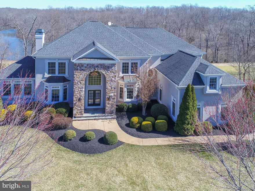 Gorgeous luxury custom home in Lake Manassas gated community w/ breathtaking views of golf course, water & woods ($300,000 lot premium pd!). Orig. owner. Grand & 2nd staircase, vaulted ceilings, wood & marble flooring, whole home audio system, 4 FP. Gourmet custom kitchen. PA flagstone terrace. Huge master suite w/ sitting rm, walk in closet, spa shower & jetted tub, media room, 3 car garage.