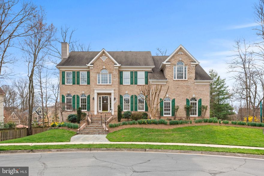 Welcome to Manors at Wolf Trap! The  elegance and tranquility in this stunning luxury residence nestled on a cul-de-sac lot that offers peaceful and ultimate blend of seclusion and sophistication. This extraordinary home boasts 6 bedrooms, 4.5 bathrooms (5 bedroom/3 full bath up, 1 bedroom and a full bath lower level)  and a thoughtfully designed layout that harmoniously blends comfort with style. This breathtaking freshly painted luxury home with many recent updates/replacements is move-in ready: HVAC(upper) 2024, lower level HVAC 2021, washer 2024, dryer 2023, cooktop 2023, microwave 2023, garage door opener(2) 2023, deck re-surfaced 2025, garage floor painting and driveway coating 2025. The sun-drenched 2-story foyer with hardwood staircase and gleaming hardwood floors throughout the main level. Kitchen boasts custom cabinets, combination build-in oven and microwave, This open-concept area opens to the family room overlooking the deck and private patio. The main level is complete with an office, half bath, and a mudroom with a washer/dryer. Upper level primary bedroom is like no other—complete with a vaulted ceiling sitting room, 2 walk-in closets, and luxurious spa bath. There are four additional bedrooms on this level, each two bedroom with a jack-and-jill bath. Fully finished lower level with a bedroom and full bath, perfect space for entertaining or relaxing. The oasis backyard with multi level brick patio and landscaping lighting system ready for holiday show, Feeding into top tier schools--Westbriar Elementary, Kilmer Middle School, Marshall High School. Private schools within minutes. You are also minutes away from the fields and courts for all the highly sought after Vienna sports programs. Just a short drive from the world class shopping and dining of Tysons(I and II), Reston, and Mosaic District. Hop on the Dulles toll road for a quick and easy ride to Georgetown/DC. The world is at your fingertips with Dulles Airport 20 mins drive from this home, and DCA airport just 30 mins away. Run, not walk to this hot property before it's gone!