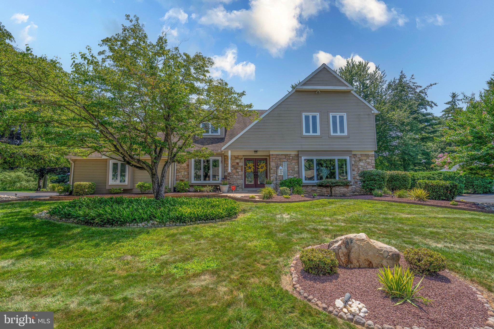 Welcome to 1277 Knox Drive , one of the largest K. Hovnanian models in the highly sought-after Yardley Hunt community! This beautifully upgraded 4 bed, 2.5 bath home offers a party-ready layout with thoughtful luxury and comfort in every corner. Step into a dramatic 2-story foyer flanked by a formal living room and private office/den. The sunken family room flows into a custom entertainer’s kitchen with maple glazed soft-close cabinetry, granite counters, and a stacked-stone wet bar. A 4-season room with its own HVAC system plus a covered patio add year-round hosting space. The primary suite feels like a private apartment with two oversized walk-in closets, a custom bath with soaking tub, and a separate dressing room. The finished basement includes a bar, game/media area, and bonus gym/storage space. Outside, enjoy manicured landscaping, stamped concrete, accent lighting, and a yard that feels like a private park. New HVAC & hot water heater (2022). Walk to trails, pools, the library, and downtown Yardley, plus easy access to I-295, Route 1, trains & award-winning Pennsbury schools!