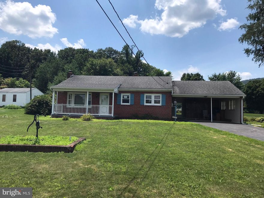 Escape to countryside living ! Traditional solid built brick ranch on level lot with carport in addition to plenty of off street parking. No HOA restrictions. Wood floors and large eat in kitchen.