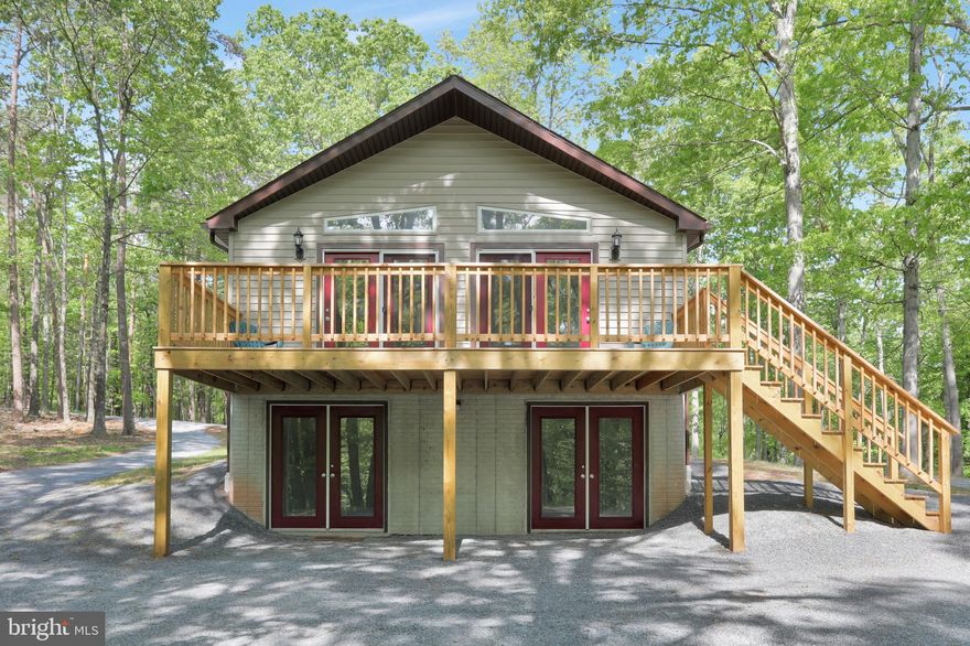 IF YOUR TRYING TO GET AWAY FROM THE HUSTLE & BUSTLE & GET SOME PEACE AND QUIET, THEN LOOK NO FURTHER. THIS TWO BEDROOM & ONE BATH  HOME  SITS ON 20 ACRES+- SURROUNDED BY WOODS. SIT ON YOUR DECK AND WATCH THE WILDLIFE & ENJOY THE QUIET THAT SURROUNDS YOU.  ABOUT 20 MINITUES OUTSIDE HISTORICAL BERKLEY SPRINGS WITH IT'S SPAS, FINE DINING, SHOPPING AND ARTS DISTRICT. APPROXIMATELY TWO HOURS FROM WASHINGTON DC & BALTIMORE. A GREAT PLACE TO GET AWAY TO ON WEEKENDS OR TO MAKE YOUR PERMANENT RESIDENCE. THE BASEMENT AREA COULD BE EASILY CONVERTED INTO MORE BEDROOMS & LIVING SPACE. NEW FRONT PORCH & DECK. NEW STAINLESS STEEL APPLIANCES. EXPLORE OR  HUNT THE UNRESTRICTED 20 ACRES+- THAT SURROUND YOU.