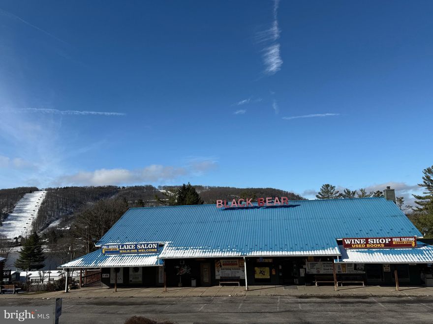 FOR SALE | PRIME COMMERCIAL OPPORTUNITY
The Black Bear Restaurant – Deep Creek Lake, Maryland
A rare opportunity to own one of Deep Creek Lake’s most recognizable commercial properties. The Black Bear Restaurant, totaling approximately 11,000 square feet, is strategically located in the heart of Deep Creek Lake, just minutes from Wisp Ski Resort, year-round recreation, lodging, and high visitor traffic.
Property Highlights
±11,000 SF commercial building
Highly visible, central Deep Creek Lake location
Flexible layout capable of housing multiple businesses (restaurant, retail, entertainment, office, or mixed-use concepts)
Strong year-round traffic from lake tourism, ski season, and local residents
Close proximity to Wisp Ski Resort, hotels, vacation rentals, and major attractions
Ample parking and excellent access
Value-Add & Expansion Potential
Ideal for redevelopment or repositioning into multiple income-producing tenants
Tesla / EV charging stations possible, adding future-forward value and increased traffic
Perfect for a flagship restaurant, brewery, retail hub, or entertainment venue
Large footprint allows for creative concepts and adaptive reuse
Financing Opportunity
Owner financing available, providing flexibility and an easier path to acquisition for qualified buyers
Investment Appeal
Deep Creek Lake continues to see strong growth as a four-season destination, making this property well-suited for investors, operators, or developers seeking long-term upside in a high-demand resort market.