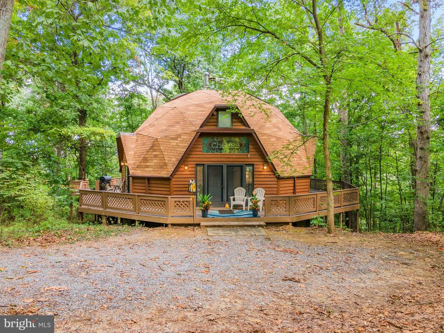 Have you ever wondered about the experience of dwelling within a Beehive? This One-of-A-Kind Dome Home offers you the closest experience imaginable! Nestled in the picturesque Mountains of Harpers Ferry, WV, this unique 3 bedroom 3 Bathroom residence sits on 1,72 acres and comes with no HOA restrictions. It's conveniently located near a myriad of outdoor activities, including kayaking and tubing on the Shenandoah River as well as hiking along the Appalachian Trail. Plus, Harpers Ferry Adventure Park is just a stone's throw away.
Schedule a showing today to explore this extraordinary property and discover what all the BUZZ is about!