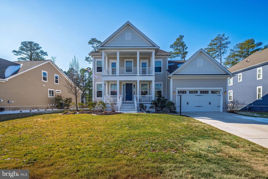 Located in the gated golf course community of Glen Riddle in Berlin Maryland, This beautiful two story home with a two-car garage offers a welcoming front porsh, an upper-level balcony, and a fenced backyard with a built-in pool overlooking water-perfect for relaxing or entertaining.
Step through the front door into a spacious foyer. To the right is the dining room, a bright and airy space to entertain your guest. to the left you'll find a private office with a full bath and closet, ideal for guests or a first-floor workspace. The kitchen is straight ahead and opens seamlessly to the family room, creating a wonderful open-concept living space. 
The family room features a stunning two-story stone gas fireplace, expansive windows, abundant natural light, and electric blinds. It flows into a bright, all-season sunroom and breakfast area, step out onto the deck overlooking the fenced yard, built in pool, and scenic water views.
The primary suite is conveniently located on the main level and offers a spacious bedroom, walk-in closets, and a luxurious bath with a large, tiled shower and granite countertops, and laundry room is also located on the first floor. Upstairs, you'll find a versatile loft area, three generously sized bedrooms, and 2 additional full bathrooms.  This home is set among mature trees, offering a peaceful and scenic setting. Numerous upgrades including gutter guards, upgraded windows, eletric blinds, and low-maintenance manufactured decking-no staining required.
Glen Riddle offers outstanding community amenities, including a clubhouse, community pool, an 18 hole championship golf course, a marina, kayaking, paddle boarding, tennis and so much more. all within a secure gated community. Conveniently located just minutes from Ocean City, MD with exceptional restaurants, shopping, and coastal attractions nearby, this warm and welcoming home truly has it all