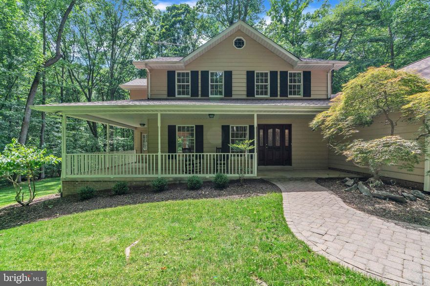 Tucked away in a private wooded setting on over 3 acres, this beautifully maintained home offers space, comfort, and endless potential. Well maintained by the original owners, it features large living areas on the main level, including a cozy stone wood-burning fireplace outfitted with a propane insert—perfect for relaxing evenings. Enjoy year-round comfort in the conditioned sunroom, which opens to a lovely slate patio—perfect for outdoor dining or quiet moments in nature. The spacious primary suite includes a sitting area, that could be converted into a 4th bedroom if desired. The unfinished walk-out basement offers tons of possibilities to expand. Recent updates include fresh paint throughout and brand-new carpet. This home blends privacy, functionality, and charm in a serene natural setting. The home is also within 30 miles of Capital Hill for DC commuting, close to local parks, the Chesapeake Bay, and the Patuxent River. Please make appointment before driving up to the home.