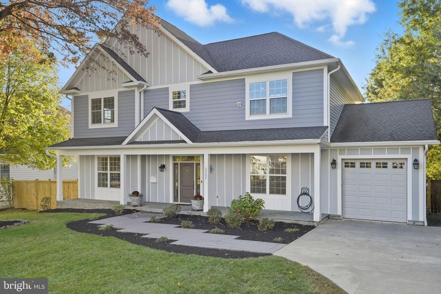 ** Special financing available at 2302 Westmoreland St! Get a rate as low as 5.50% with a Seller Buy-Down, subject to lender approval. Please inquire fore more details! **

**Open House, Sunday 1:30 to 3:30pm**

Inside you will discover light-filled interiors, rich hard wood flooring throughout and thoughtful architectural details that enhance both form and function. The open-concept layout welcomes you with a spacious foyer that leads into an inviting living room framed by oversized windows and a beautifully finished fireplace with glass doors and a mantel—perfect for cozy evenings or casual gatherings.
A formal dining area opens to the stunning gourmet kitchen where white shaker cabinetry, stainless steel appliances, granite countertops and a large center island await. This space is ideal for entertaining or preparing everyday meals, with bar seating, gas cooking, and a layout designed for flow. A pantry plus wall mounted microwave and oven combination offers plenty of storage and convenience. 

The main level also features a flexible bedroom or office/den—perfect for multigenerational living or work-from-home needs—as well as a mudroom and powder room to support the demands of a busy household. Upstairs, the spacious primary suite is a true retreat, offering hardwood floors, ample closet space and a luxurious en-suite bath with dual vanities, a deep soaking tub beneath a picture window and an oversized walk-in shower with custom tilework.

The upper level feature a Jack and Jill bedrooms that share a nicely updated bathroom, a 3rd bedroom plus a hall bath. A dedicated laundry area is also located upstairs for maximum convenience. Throughout the home, large windows allow natural light to pour in, highlighting the warmth of the hard woods and the elegance of the design.

Step outside to your private backyard oasis, where a fully screened-in porch featuring a stone fireplace, wood paneled ceiling, recessed lighting, ceiling fan and a TV month creates the perfect space for year-round enjoyment. The adjacent custom stone patio extends your living space and is ideal for grilling, lounging, or dining al fresco. A professionally landscaped yard, privacy fencing and a luxurious built-in spa/hot tub complete the outdoor experience.

Additional highlights include an attached garage, a floored attic for extra storage, and a spacious finished basement offering endless potential—whether you envision a home gym, media room, workshop, or recreation area. Throughout the home, you’ll find thoughtful upgrades like smart thermostats, ceiling fans in every room, energy-efficient windows, recessed lighting, and a complete set of quality appliances.
Situated in Westmoreland Gardens, one of Falls Church’s most established and beloved neighborhoods, residents enjoy a peaceful setting with mature trees and wide walkable streets. You’re just a short stroll to Tuckahoe Park, Westover Village, and the W&OD Trail, with easy access to vibrant downtown Falls Church and nearby Clarendon. The East Falls Church Metro is minutes away, offering a seamless commute into Washington, DC. The neighborhood's proximity to Route 66, I-495, and Route 7 makes it ideal for professionals, families and anyone seeking both serenity and connectivity.

Zoned for the highly desirable Haycock Elementary, Longfellow Middle, and McLean High—this home delivers not only in lifestyle but also in long-term value. 

This is the rare opportunity to own a thoughtfully designed, move-in-ready home in one of Northern Virginia’s most desirable communities. Style, comfort, location, and lifestyle—all in one exceptional offering.  Schedule your tour today!