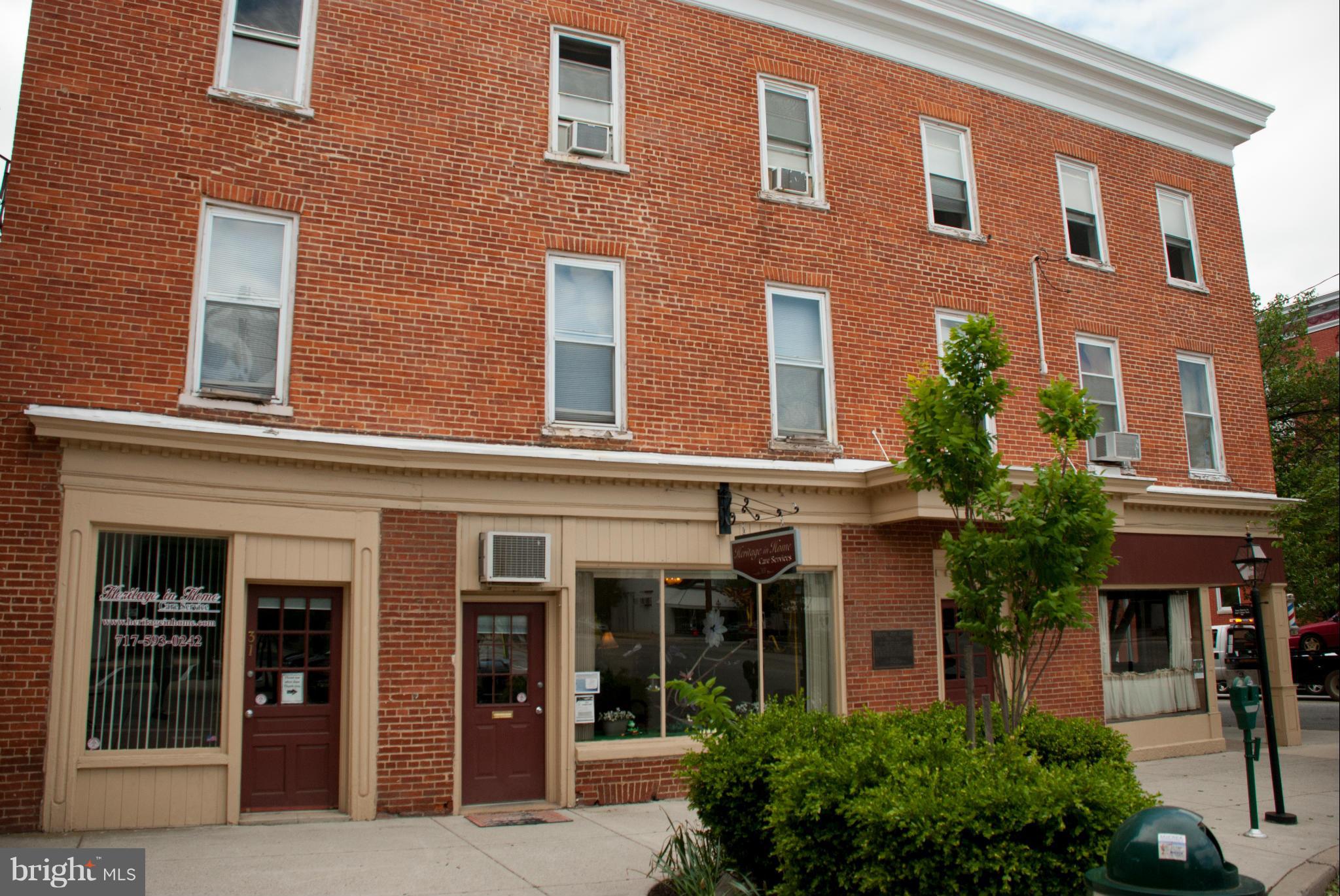 Great downtown location! Near shops, banking, and restaurants! One bedroom, one bathroom apartment on the 2nd floor. Large living room open to the kitchen with space for a dining table. Water/sewer/trash are included, tenant pays electric.