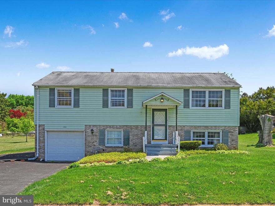 Welcome to 131 Garden City Drive! This bi-level boasts abundant natural light with a large sunroom, screened porch, and patio overlooking the spacious, flat yard. Three bedrooms upstairs with hardwood floors, plus another bedroom downstairs with a family room and half bath, as well as a mudroom through the garage. Get ready to make this home your own!