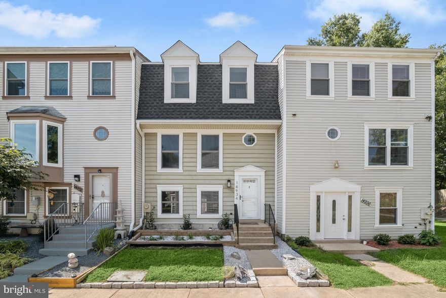 Spacious, 3 level townhome located in the amenity rich Princeton square community of  Bowie. This stunning home boasts design inspired finishes and updates throughout including the roof, gutter guards, carpet, lighting, hardware, storm door, trim, and more!  Sun fills the foyer and living room from the 2-story ceiling with windows and highlights a wood burning fireplace refinished with an elegant porcelain tile surround, bamboo flooring, and a trendsetting color palette.  The open concept dining room and kitchen feature a custom marble honeycomb backsplash, granite countertops, stainless appliances, and offers access to the private backyard.  Ascend the staircase to the owner’s suite level that includes a bright and airy loft providing additional living space and the owner’s bedroom that offers a walk-in closet and an en suite full bath renovated with stylish modern accents.   The top level provides two sizable bedrooms, and a full bath.  Enjoy outdoor living in your private, fenced backyard on the recently updated patio and all the varied amenities this community has to offer that include a swimming pool, and sports courts. Conveniently located with plenty of nearby shopping, dining and entertainment options.   Routes 50, 197, and 301 provide easy commuter access to Washington DC, Baltimore, and Annapolis.
