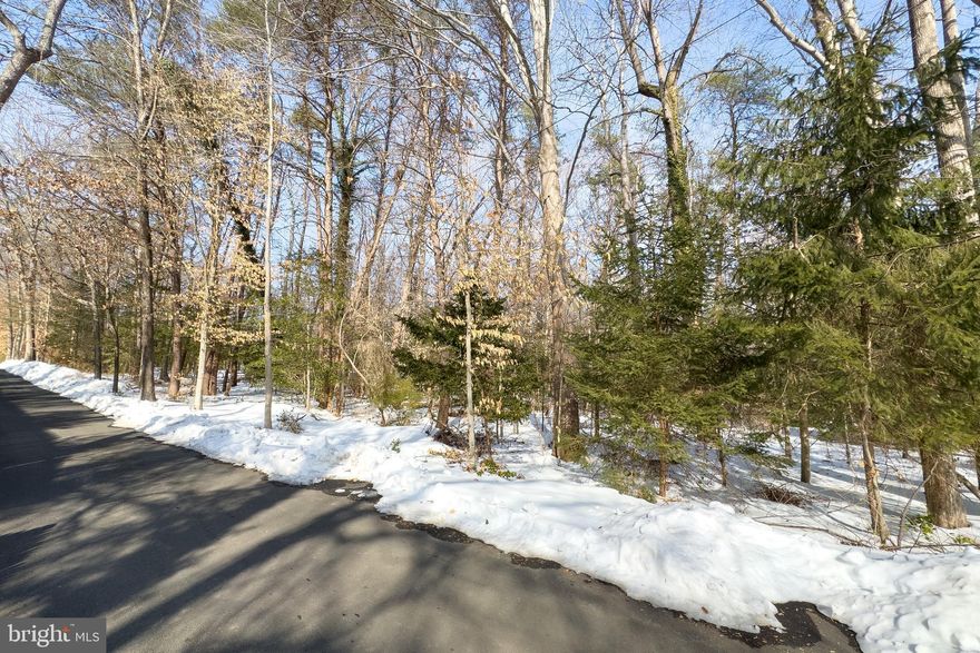 Rare opportunity to own 1 acre of raw land along Popes Head Rd in Fairfax, directly adjoining a larger acreage parcel—offering flexibility for a stand-alone custom home site, a builder project, or a strategic long-term investment. Surrounded by established homes, this parcel sits in a desirable, low-inventory area where land opportunities are increasingly limited.  Electric is available at the property line. No existing well or septic—buyer to conduct all due diligence regarding zoning, building approvals, utility installation, and overall feasibility. Ideal for a buyer looking to design and build a custom residence, or for a builder/investor seeking future upside in a sought-after location with strong surrounding values. 
Convenient access to Fairfax, major commuter routes, shopping, dining, and everyday amenities while maintaining a private, residential setting.