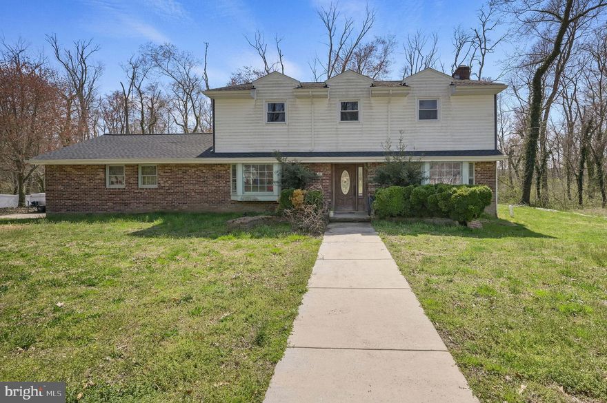 If you have been looking for space, privacy, and a lot that actually gives you room to breathe, this is one worth seeing. This 4 bedroom, 3 bath brick front home sits on .92 acres in Eden Roc and backs to the woods and a peaceful creek, giving you a setting that feels private and hard to find. Inside, you have spacious rooms, a flexible layout, a large living room with bay windows, teak wood flooring, a brick fireplace, formal dining space,  and a bright sunroom that brings in great natural light and overlooks the backyard. Outside, the large deck gives you even more room to relax, entertain, and enjoy the natural setting. With a 2 car garage, no HOA, and easy access to Routes 1 and 8, this home offers a ton of potential in a quiet location.