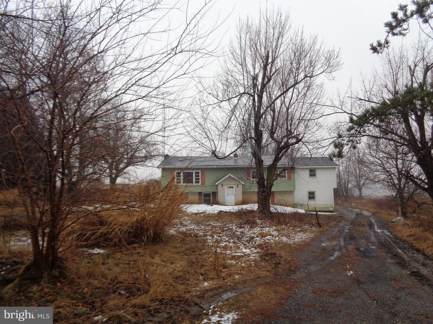 Great opportunity for the person with vision to make this property shine again.  Set on 5 acres but conveniently located to shopping, schools and I-81.

Lender approved short sale.

Home is a total rehab project.