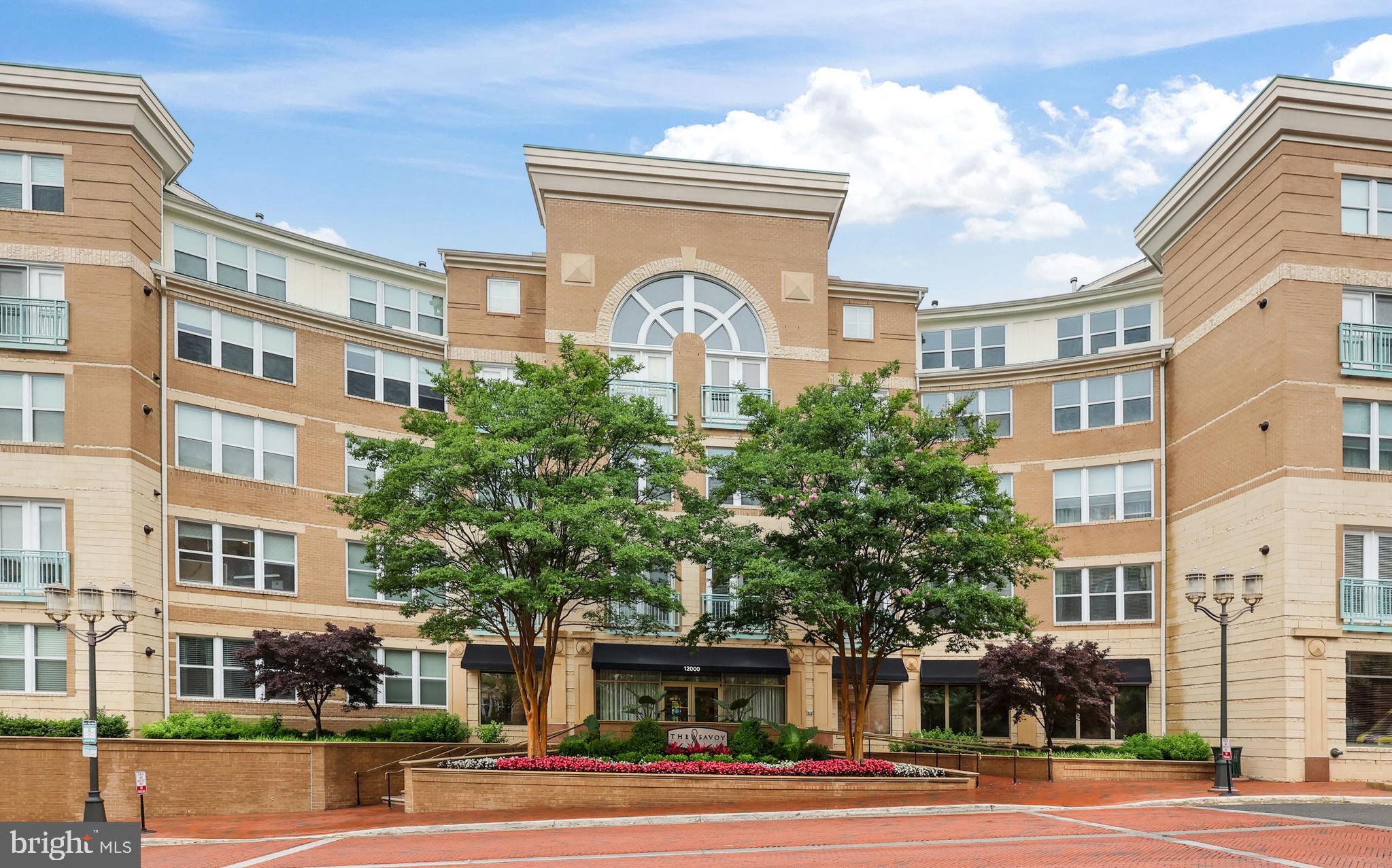 Welcome to this beautifully updated 2-bedroom, 2-bath condo in the sought-after Savoy at Reston Town Center. Each spacious bedroom features its own private full bathroom. Recent updates include brand new carpet, fresh interior paint, new stainless steel appliances, modern light fixtures, and granite countertops in the kitchen. The open layout is filled with abundant natural light, creating a warm and inviting atmosphere. Enjoy the exceptional community amenities, including a stunning outdoor pool, lushly landscaped courtyard, grilling areas, a fitness center, media room, billiards/game room, party spaces, and a business center. Ideally located just steps from the heart of Reston Town Center, you’ll have easy access to premier shopping, dining, and entertainment, plus several major commuter routes. Don’t miss the opportunity to make this fantastic condo your new home!