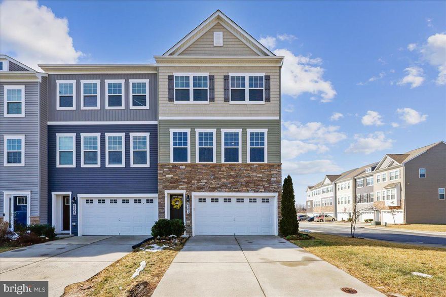 Welcome to 6501 Britannic Pl, open Sunday, 3/15 from 2-4pm! You won't want to miss this stunning end-unit townhome, complete with all the bells and whistles! The open floor plan of the main level makes it a perfect place for entertaining; complete with 9' ceilings throughout, start in the spacious Living Room open to a dining area, flowing into the table space Kitchen featuring a separate pantry, stainless steel appliances, and granite counters, as well as a large island with breakfast bar,  all the way outside through the sliding glass door to the deck overlooking the back yard. The upper level includes a spacious Primary Bedroom and Bathroom, plus two additional Bedrooms, a hall Full Bathroom, and convenient Laundry Room.  The Lower Level features another full Bathroom, plus a Rec Room that walks out to the patio and fully fenced back yard. Full two car garage plus extra parking spaces in the driveway. Low monthly HOA fee includes trash pick up, snow removal, and extra visitor parking. Neighborhood is conveniently situated with access to 270, 70, 15, and 355. Plenty of shopping, restaurants, and entertainment close by in downtown Frederick.