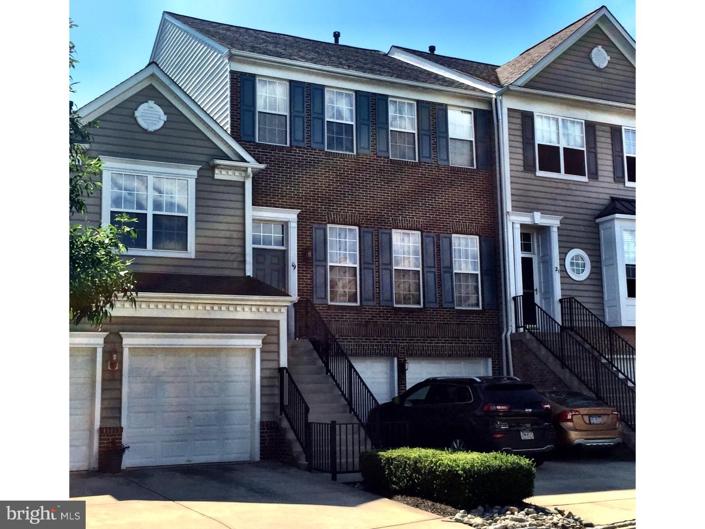 The envy of Doylestown Station! This Immaculately well kept 3 Bedroom 2.5 Bathroom Brandon II Model Luxury Townhome is situated on a Premium lot overlooking the Serene Doylestown Central Park! You cannot help but notice the Upgraded Brick Facade as you walk up to this Incredible Home. Walk into the Huge Living Room with Gleaming Hardwood floors throughout; oversize Windows allow extra Sunlight to flow into the Living Room. The Open Dining Room sporting a Trim lined Tray Ceiling really opens up the entire Floor Plan. Situated around the Open Rail Staircase is the Family Room with a Gas Fireplace.  Walk-out onto the Newly Refinished over sized Deck and enjoy having those late Evening Dinners overlooking the Park. The kitchen is truly one of the Spectacular Highlights of this home. Ceramic Tile Floors, Luxurious Granite counter tops and Stone Backsplash will only begin to Catch your Eye as you will also notice the Custom 48" Wooden cabinets and Top of the line Kenmore Elite Stainless Steel Gas Range, Refrigerator, Microwave and Dishwasher. The Kitchen also features a Double Basin Kohler sink with an Instant Hot water heater and a newly installed State Of The Art Moen MotionSense Touchless Facet. The Second Level features Bamboo Flooring throughout the three Spacious Bedrooms and hallway.  The Master Suite includes a Full Bathroom with His/Her sinks, Moen fixtures, large Kohler Soaking Tub and standing Shower Stall; as well as a Walk-In Closet with upgraded closet Organizing Systems.  Upstairs Laundry room features high end Kenmore Elite Front Loader Washer and Dryer. The fully finished Basement offers plenty of space for Entertaining guests or just relaxing in your "Mancave." The Basement sports a Large Rec Room which has been converted into an In-home Movie Theater. The Basement also includes Extra Storage rooms, entrance into the 2-car garage and walks out onto the Lower Level Deck and Patio. Some other features include Energy Efficient Windows, Legrand Whisper Switches, Nest Smart Thermostat + Nest Protect (Smoke & CO Alarm), PremDor insulated Front Door with Schlage Keyless Entry System. Condo Assocation takes care of all Common Area, Exterior building Maintenance and Driveway Snow Removal. Top notch Central Bucks School District. Just Minutes away from the Shops and Restaurants in Doylestown Boro, SEPTA Regional Rail Doylestown Station and the main Transportation Routes of 611 and 202. Do not miss this opportunity to call this beauty your home.
