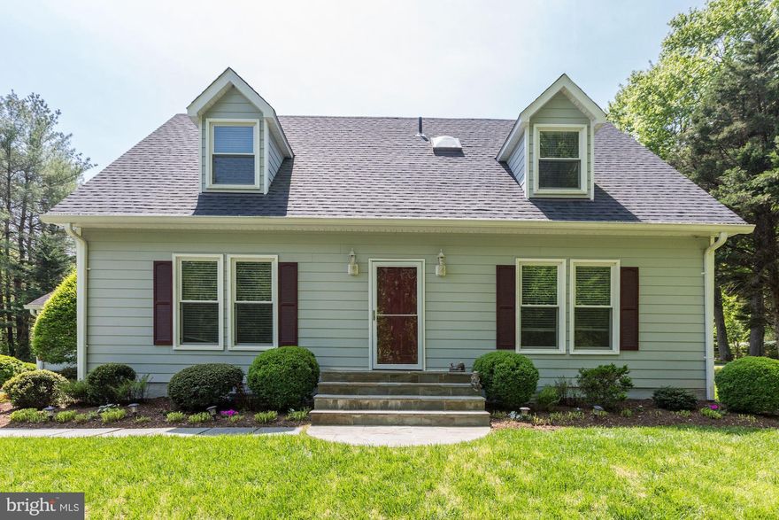 PRICE REDUCTION on this beautiful Cape Cod home in Walt Whitman school district.  Fantastic updates throughout including all new windows, HVAC system, hot water heater, new roof and more!   Bamboo wood floors and plentiful natural light throughout. Spacious living room flows into the open dining area and kitchen. Sleek granite countertops and a gas cooktop island are featured in the kitchen. Two bedrooms on the main floor with a full bathroom. Two bedrooms on the top floor with full bath. Finished basement offers plenty of additional living space with a kitchenette, washer/dryer, and flexibility for a bedroom in-law suite or rec room. Gorgeous deep yard with established gardens, putting green, patio.  Restaurants, shops, walking trails close by. Convenient access to DC, Virginia and other points in Montgomery County.